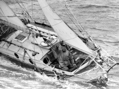 Circa 22nd April 1969: Robin Knox-Johnston waving aboard his 32ft yacht SUHAILI  off Falmouth, England  after becoming the first man to sail solo non-stop around the globe. Knox-Johnston was the sole finisher in the Sunday Times Golden Globe solo round th
