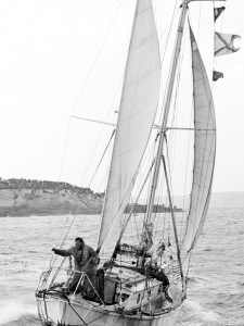 Circa 22nd April 1969: Robin Knox-Johnston waving aboard his 32ft yacht SUHAILI off Falmouth, England after becoming the first man to sail solo non-stop around the globe. Knox-Johnston was the sole finisher in the Sunday Times Golden Globe solo round the